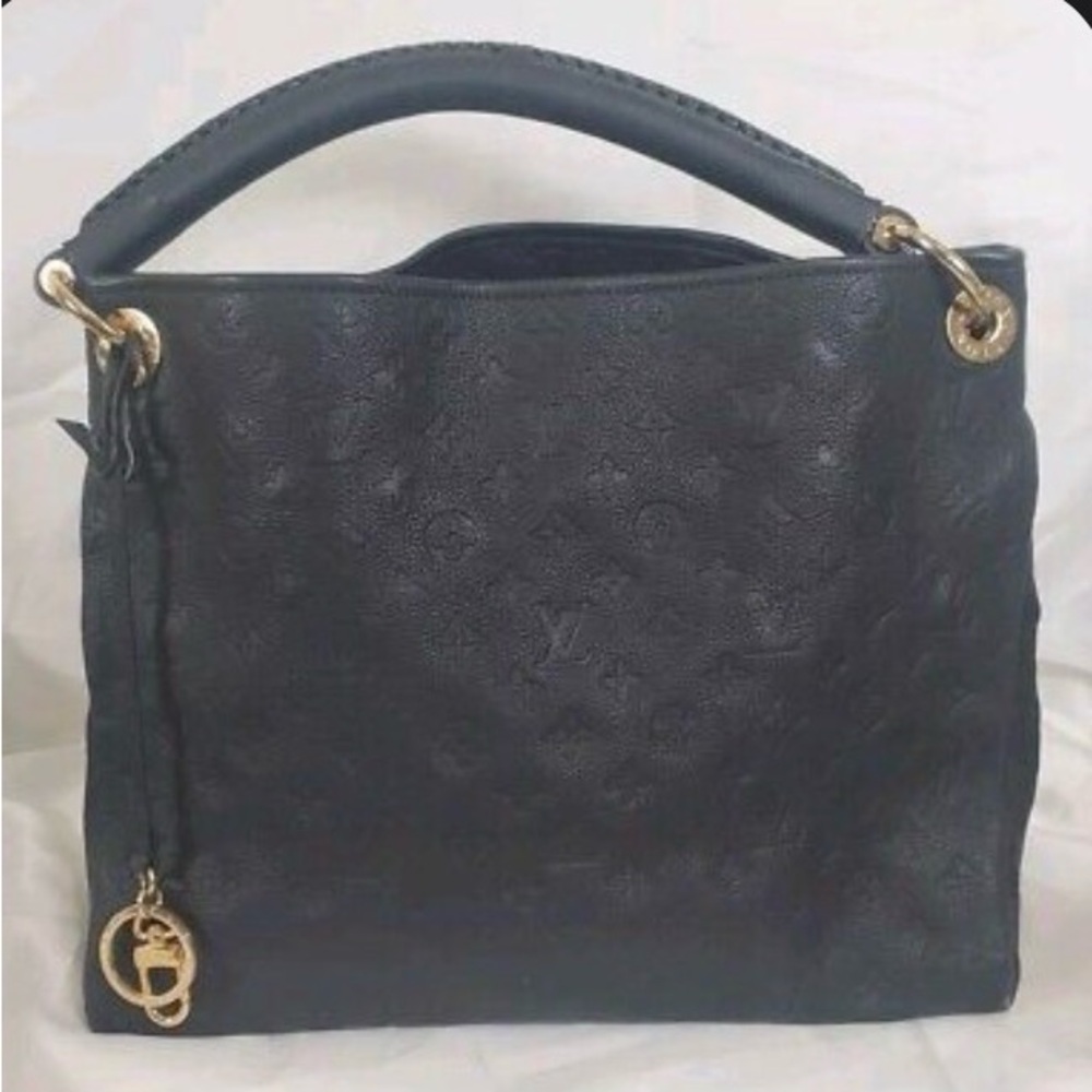 Louis Vuitton Black Monogram
Empreinte Leather Artsy MM Hobo - Picture 1 of 16